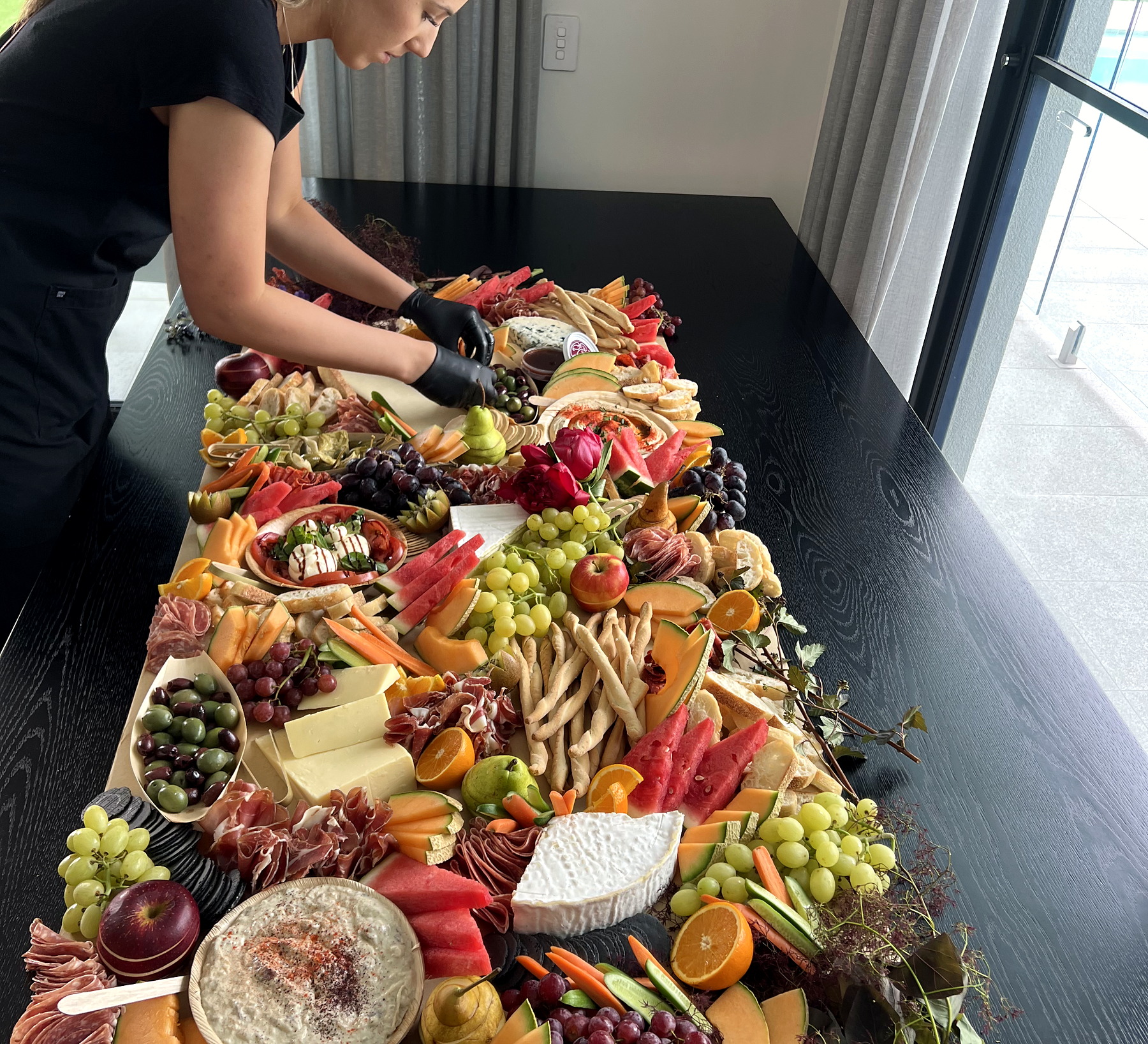 An everydayfood grazing table being prepared
