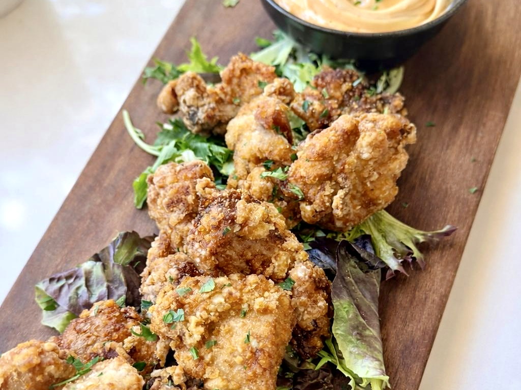 Crispy everydayfood bites presented on a serving board