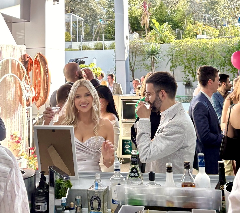 A polished bar presence at a wedding event