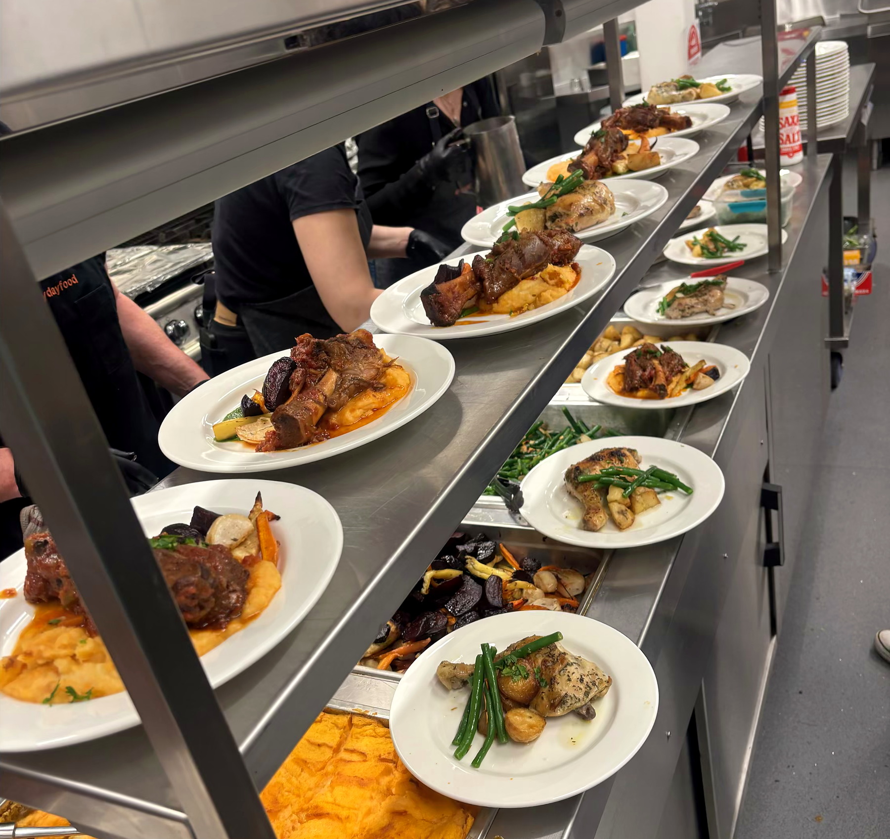 Everydayfood chefs plating seated wedding meals
